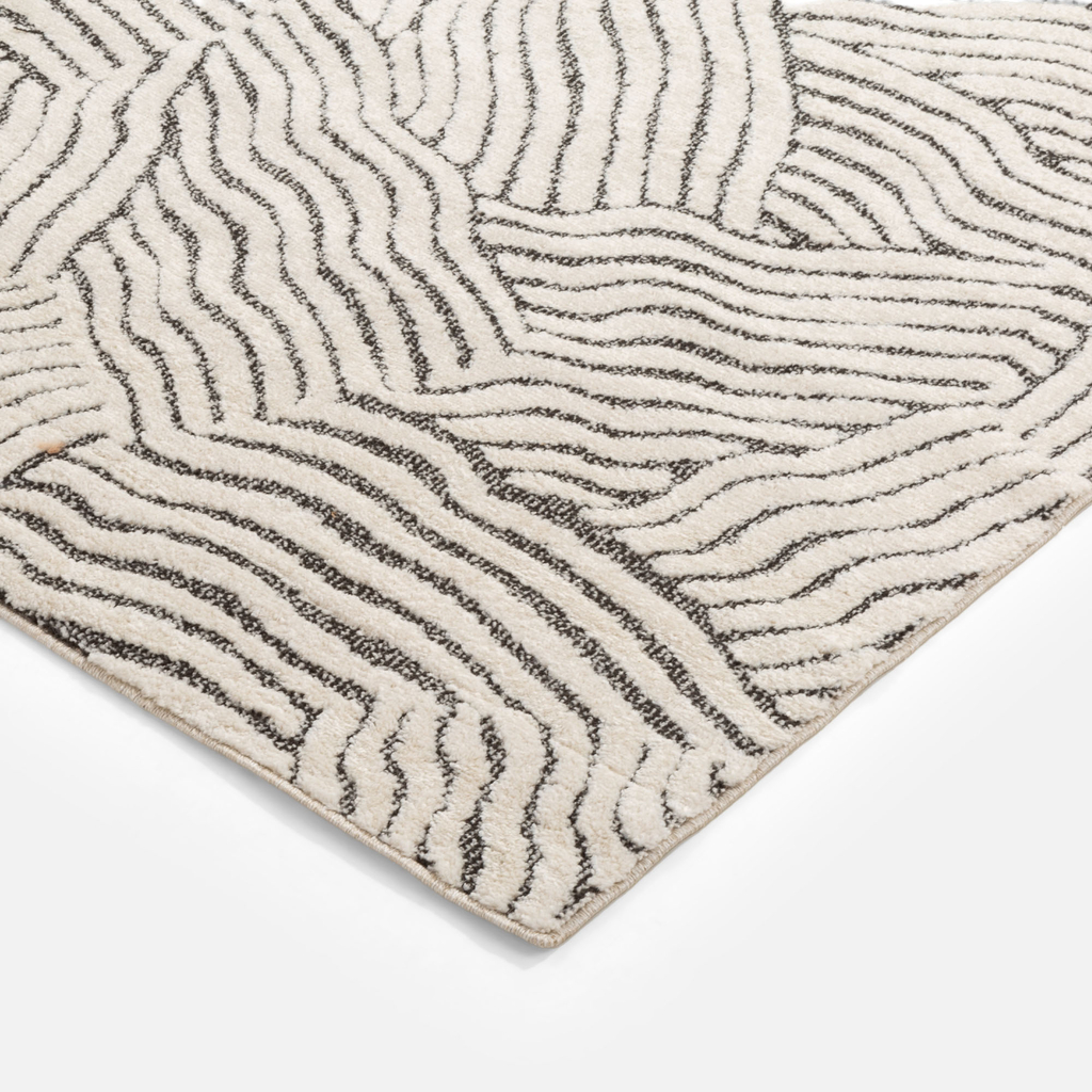 Abstraktný koberec v béžovej a čiernej farbe DEUS 80x150 cm