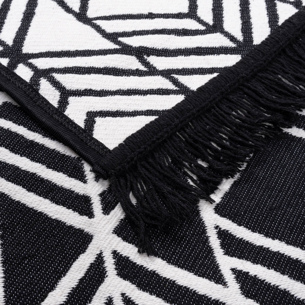 Geometrický koberec čierno-biely ALBORG 50x80 cm