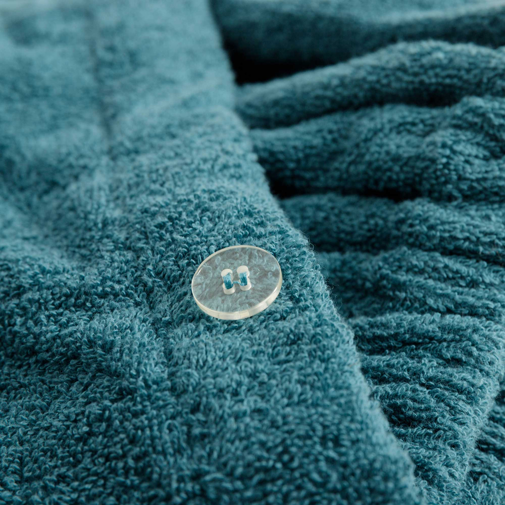 Uterák do sauny v tyrkysovej farbe KILT SAUNA&WELLNESS 60x160 cm