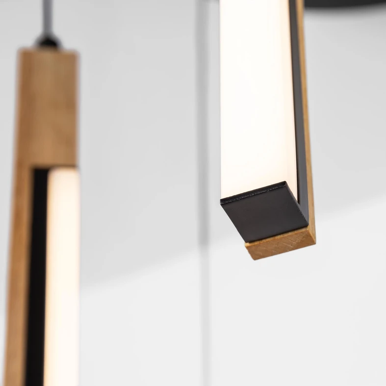 Lampa wisząca ELIOT to oświetlenie do wnętrz przestronnych nowoczesnych z lekką, futurystyczną nutą.