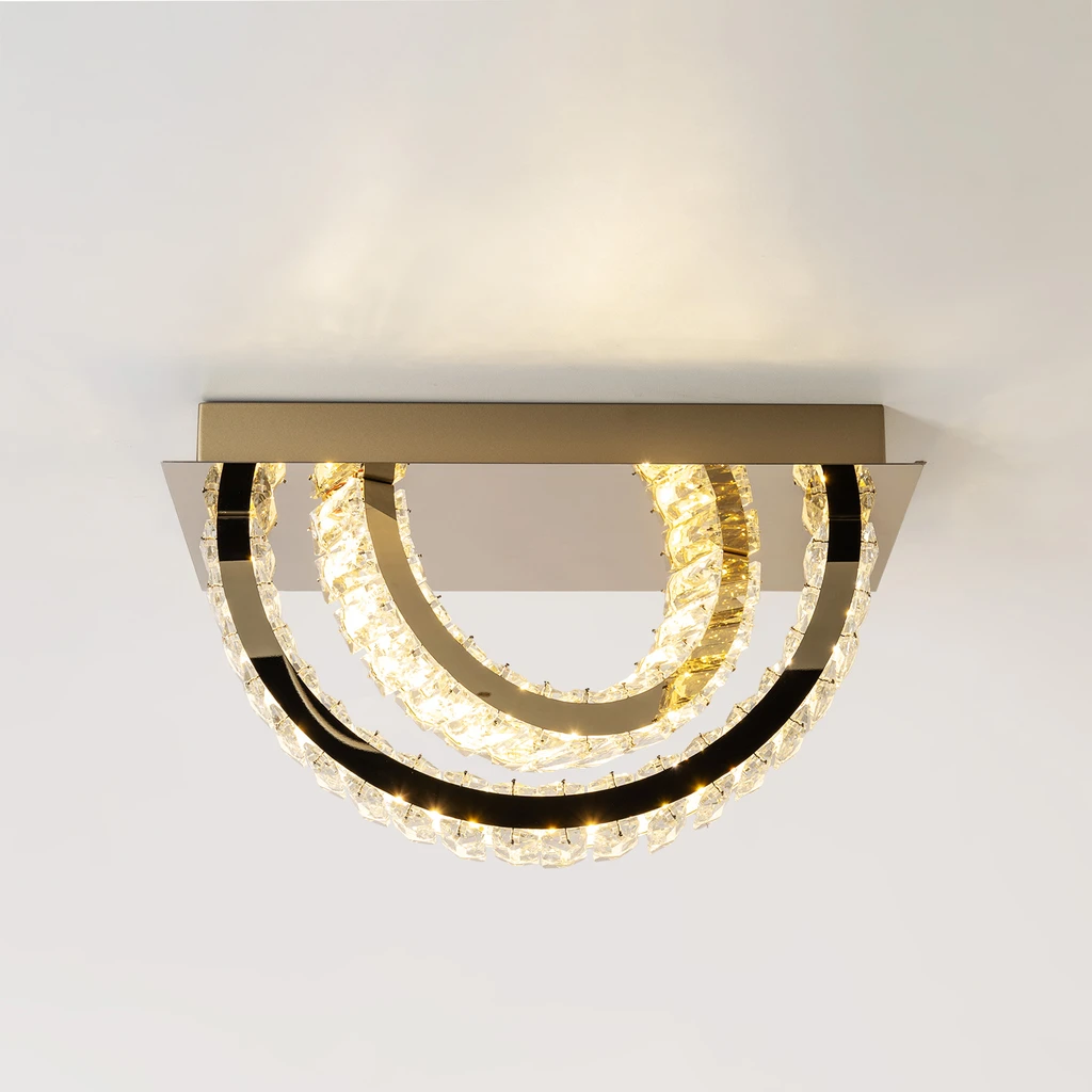 TULA w salonie to oświetlenie, a zarazem piękna dekoracja w klimacie glamour.