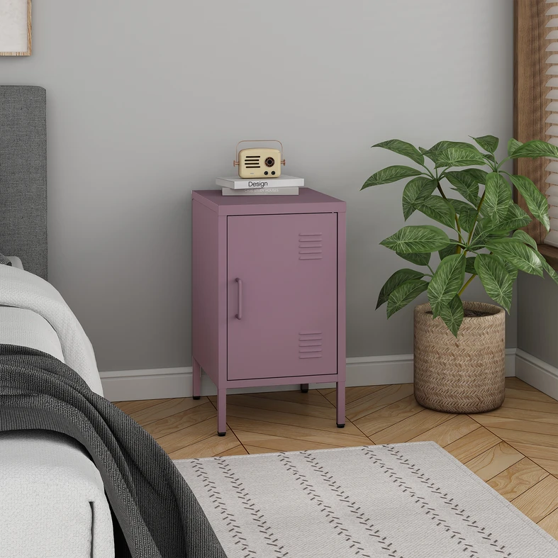 Fioletowa, metalowa szafka nocna na wysokich nóżkach.