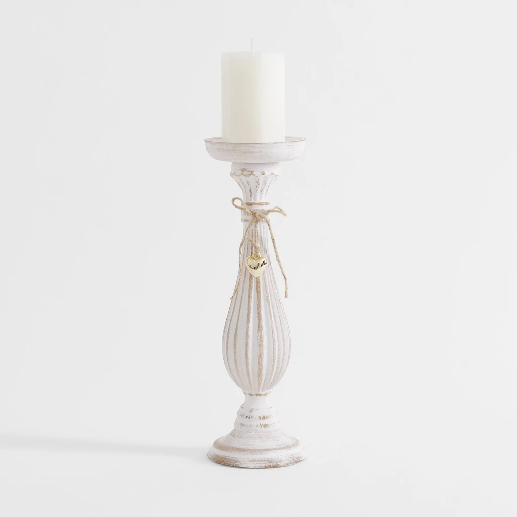 Biały świecznik na jedną świecę