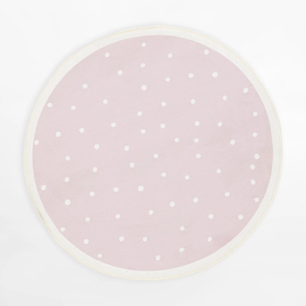 Okrągły dywan w kropki