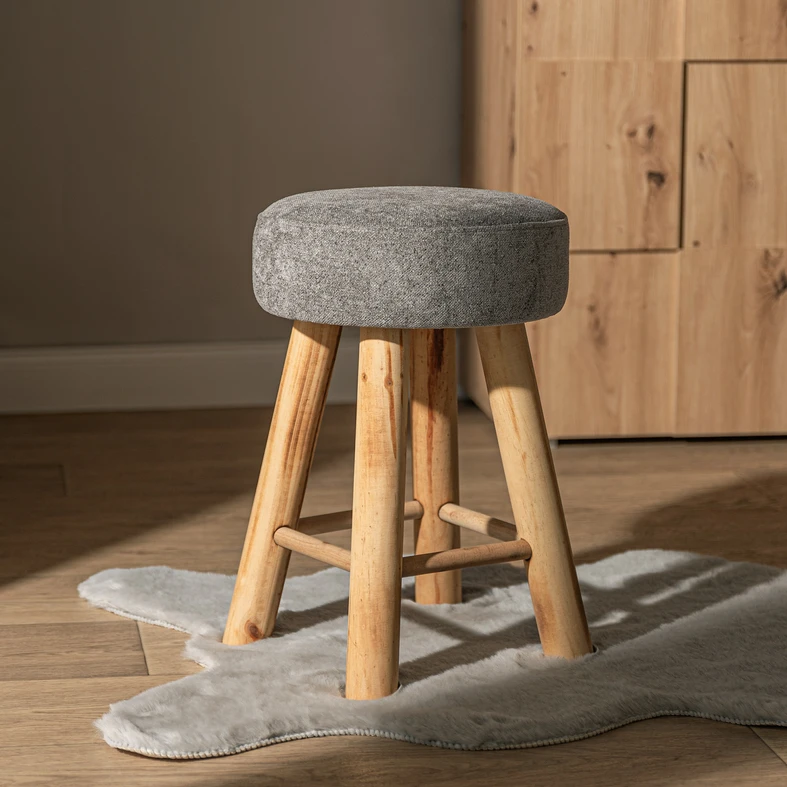 Čalúnená sivá taburetka TROPICOSI