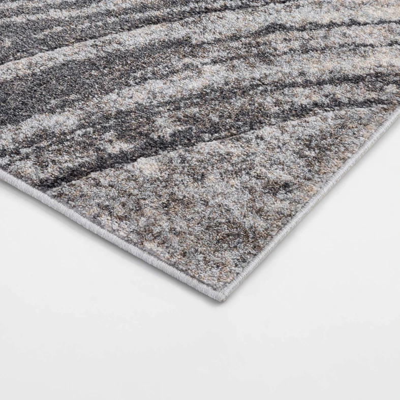 Prostokątny dywan abstrakcyjny szary