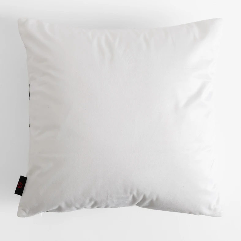 Welurowa biała poszewka w zielone liście