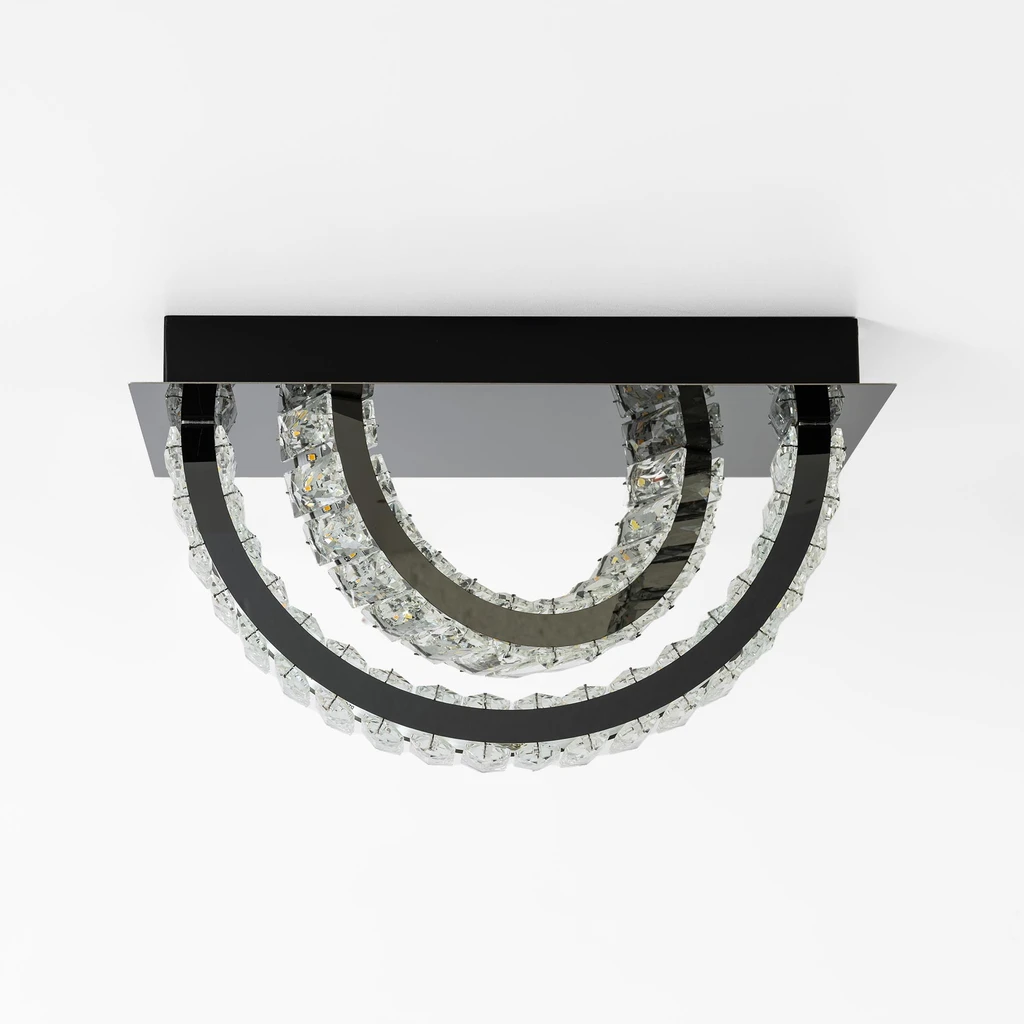 TULA w salonie to oświetlenie a zarazem piękna dekoracja w klimacie glamour.