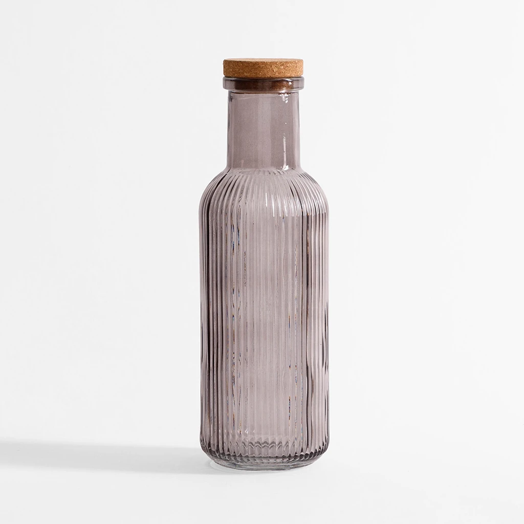 Szklana kolorowa butelka z korkiem