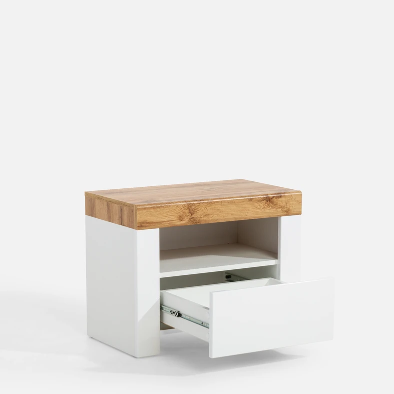 Biała szafka nocna z szufladą i otwartą półką.