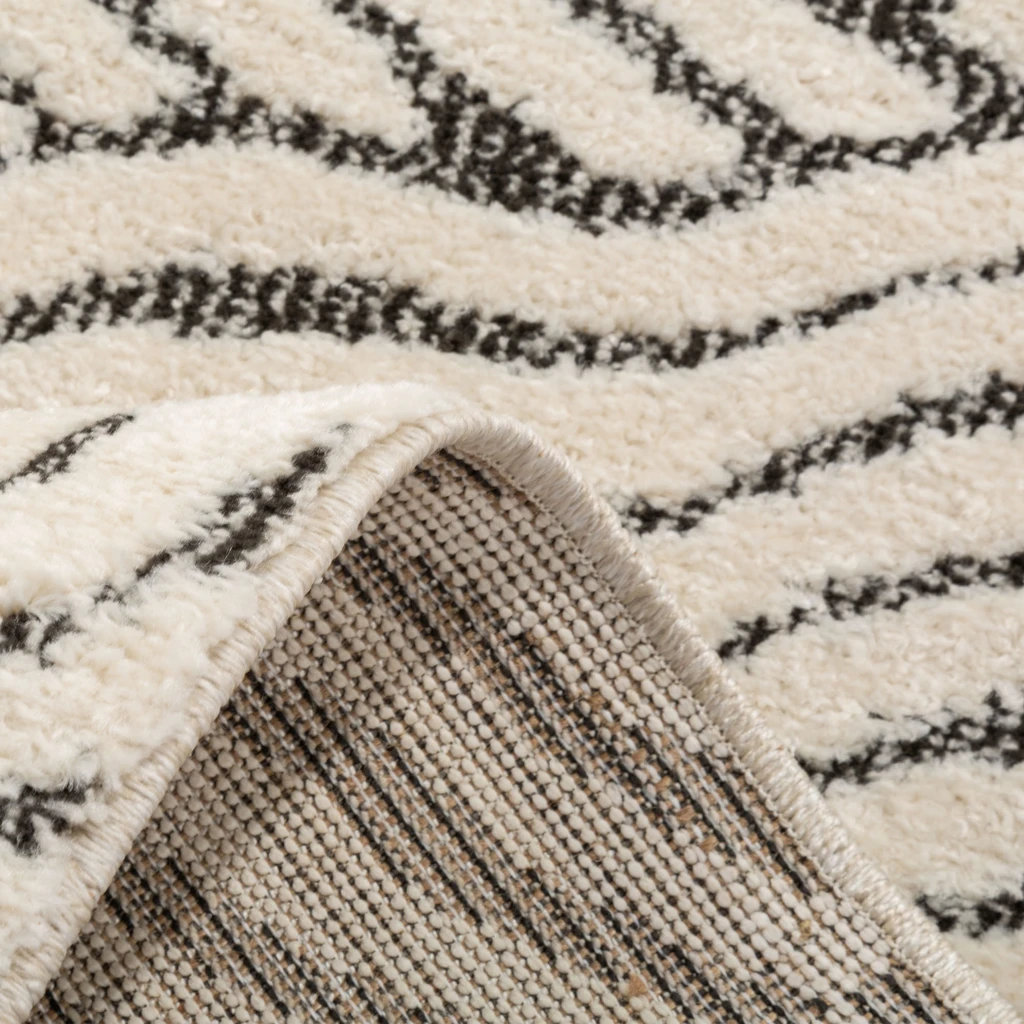 Abstraktný koberec v béžovej a čiernej farbe DEUS 80x150 cm