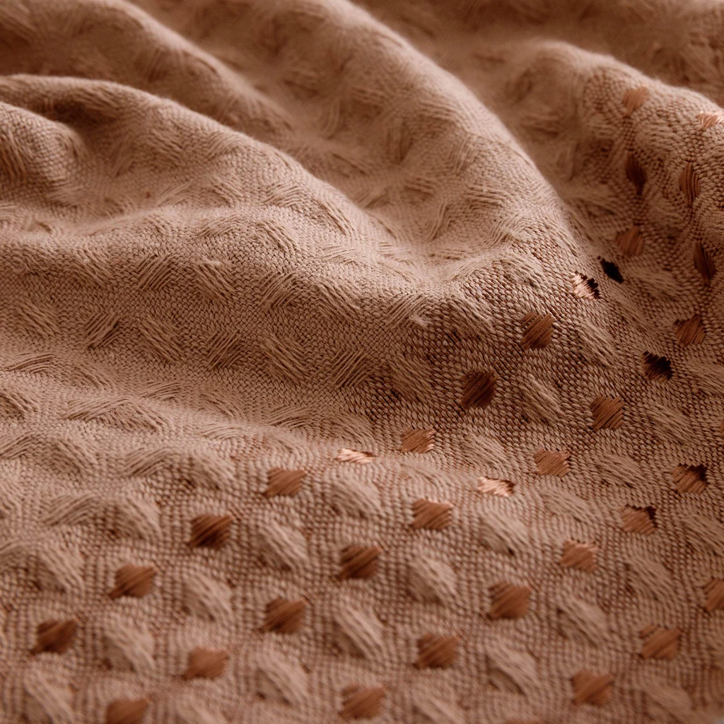 Bawełniany ręcznik o fakturze waflowej o kolorze cappuccino