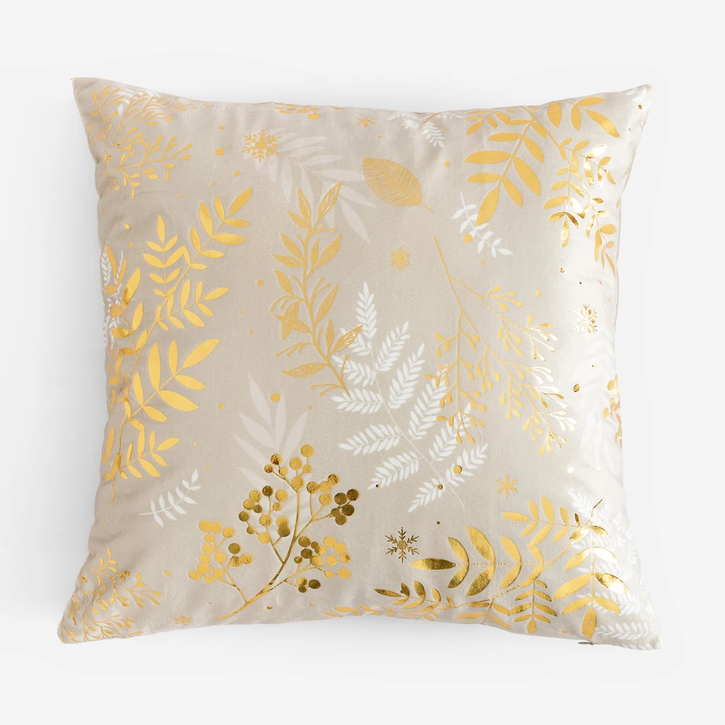 Dekoracyjna poszewka z miękkiego, beżowego poliestru przypominającego welwet. Na poszewce nadruk z motywem roślinnym.