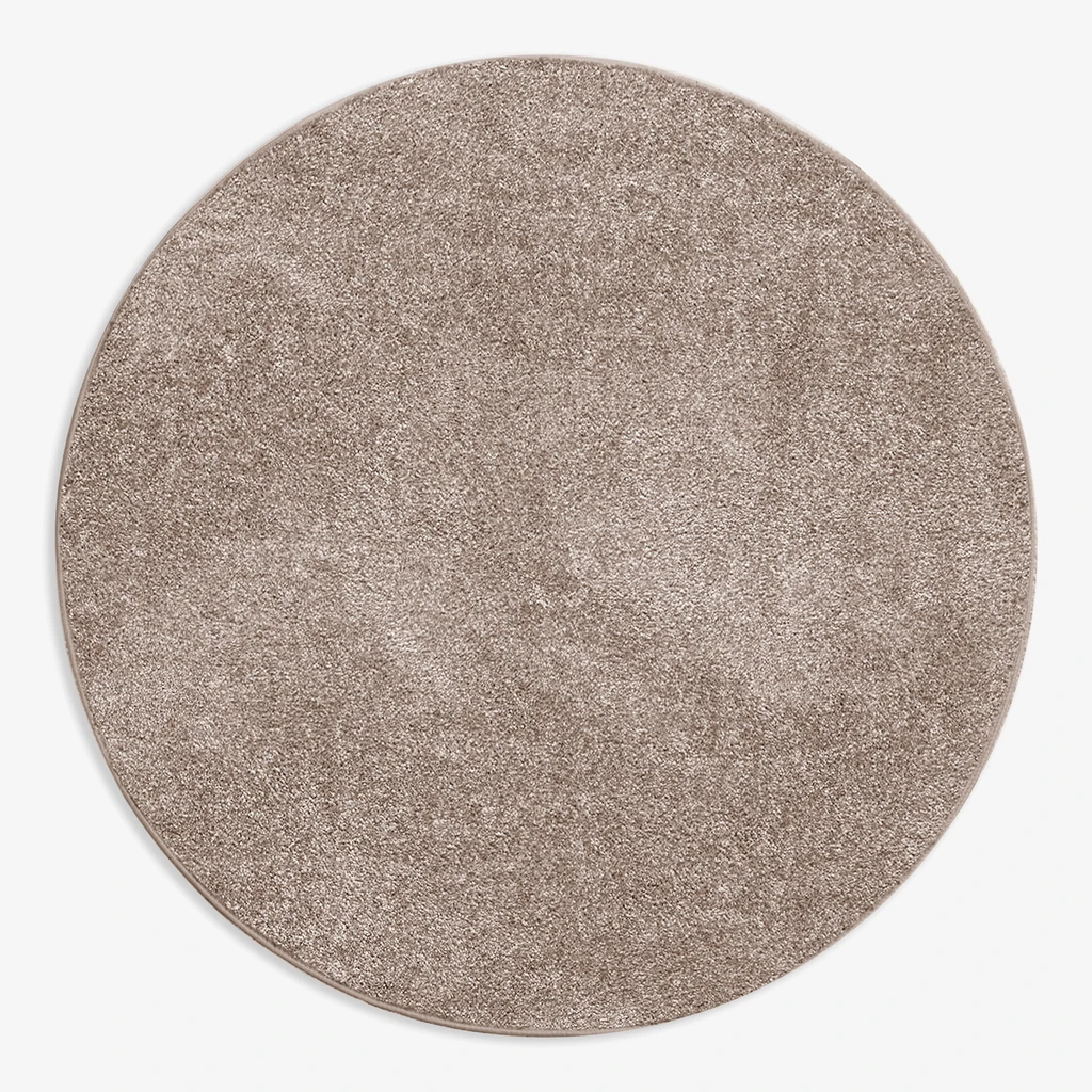 Dywan okrągły taupe CLEVER 130 cm wykonany z przędzy polipropylenowej.