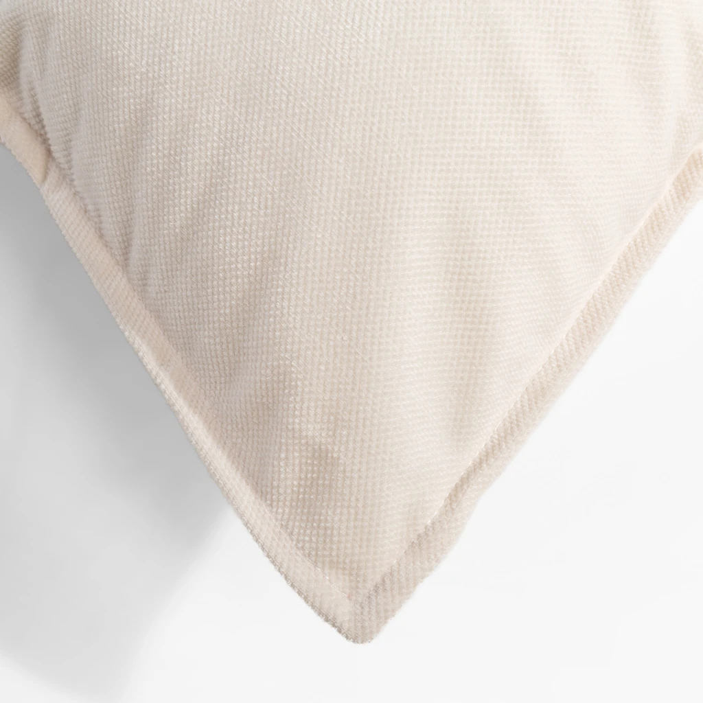 Kremowa poszewka dekoracyjna z zamkiem błyskawicznym