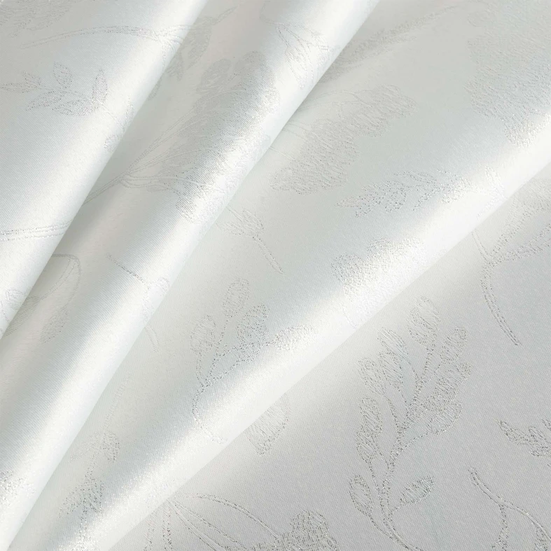 Biały bieżnik na stół z roślinnym motywem