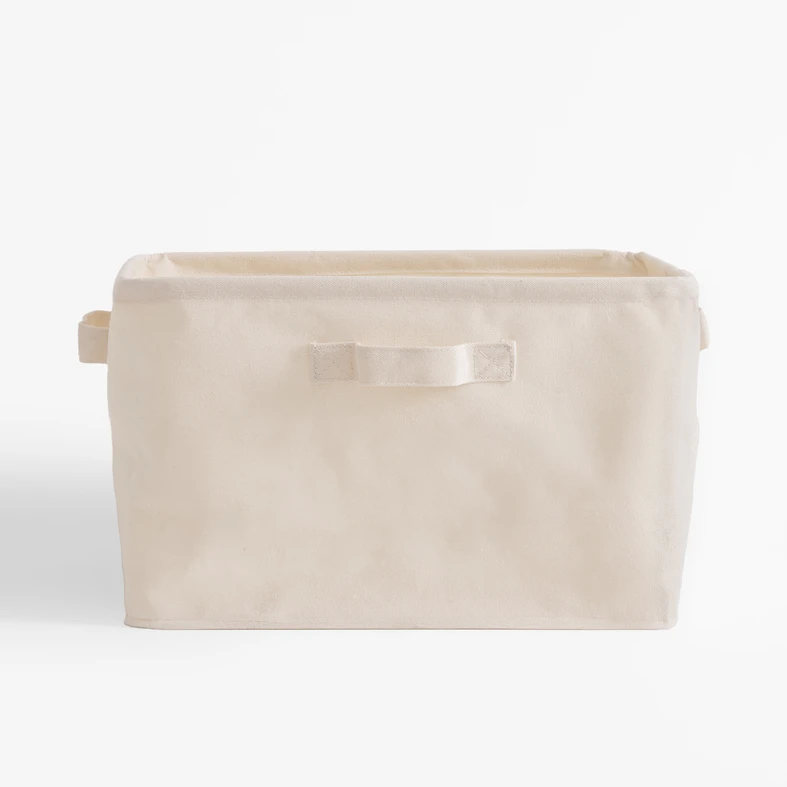 Beżowy pojemnik z uchwytami