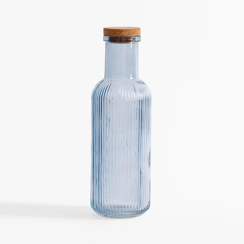 Szklana kolorowa butelka z korkiem