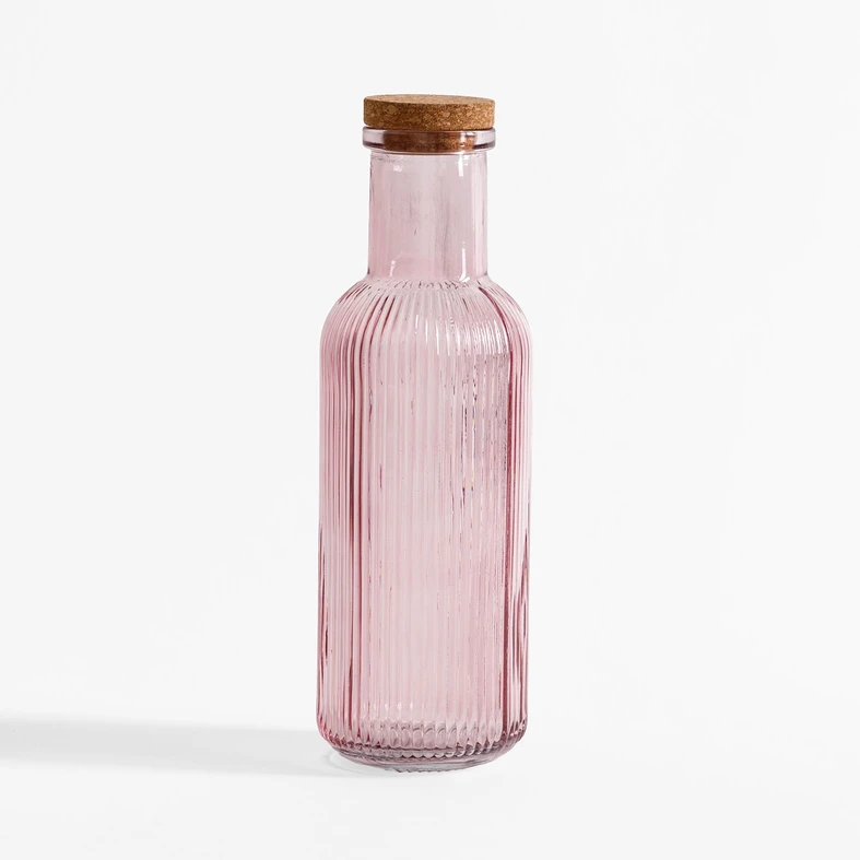 Szklana kolorowa butelka z korkiem