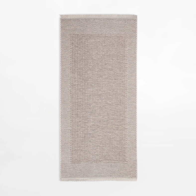 Prostokątny beżowy dywan