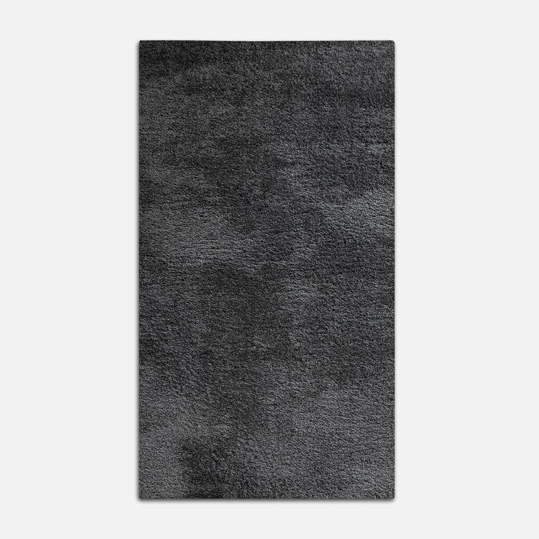 Dywan grafitowy FURRY 80x140 cm wykonany z przędzy polipropylenowej.