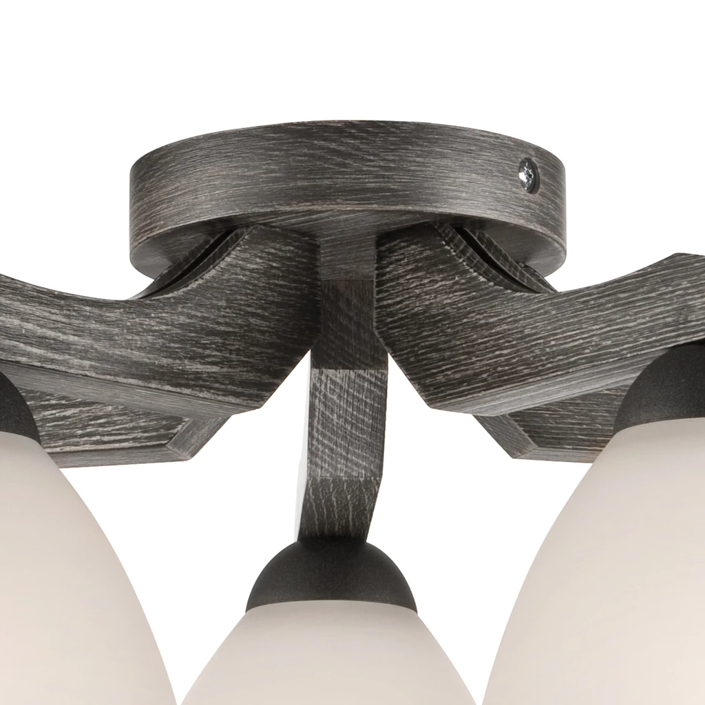 Ozdobna część w kolorze grafitu i wzorze drewna.