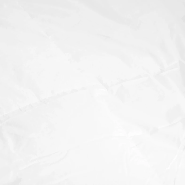 Puchowa biała kołdra na podwójne łóżko