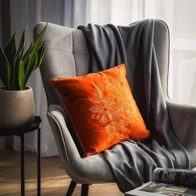Pomarańczowa welurowa poszewka do salon