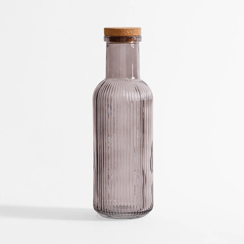 Szklana kolorowa butelka z korkiem