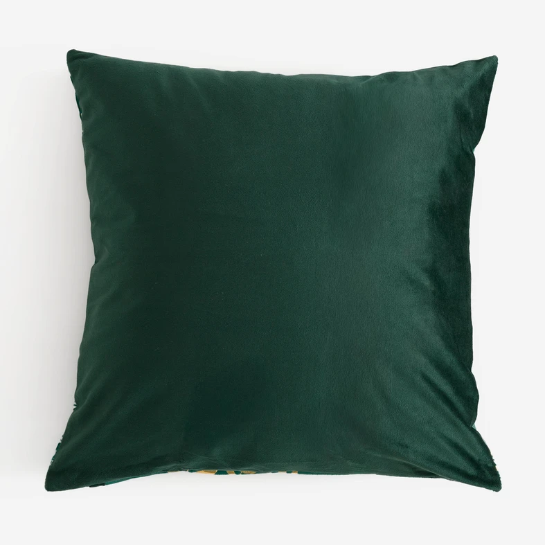 Rewers ciemnozielonej poduszki bez wzoru. 