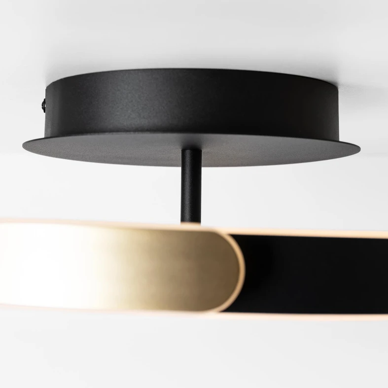 Lampa sufitowa LED, w kształcie pierścienia - idealna dla salonu lub sypialni.