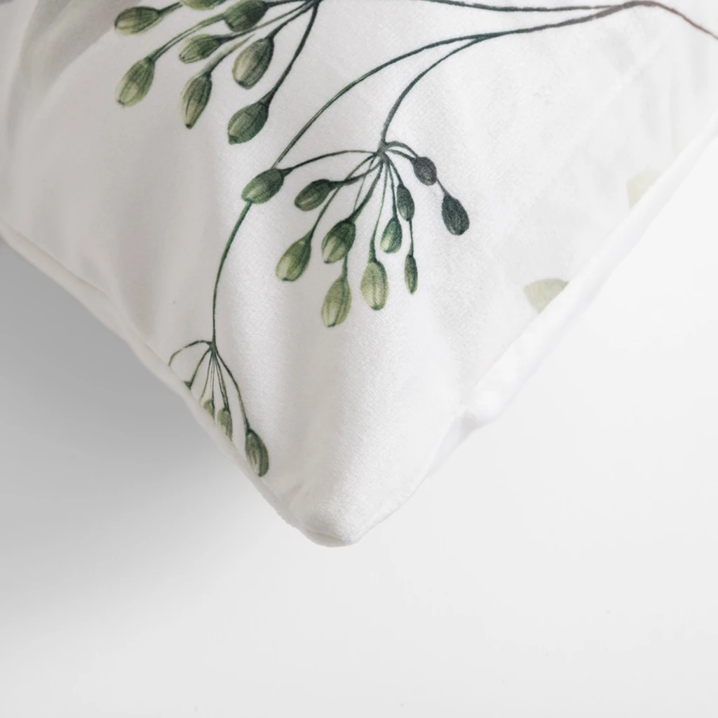 Welurowa biała poszewka w zielone liście