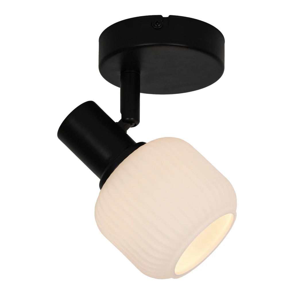 Kinkiet STEM dopasujesz do kameralnych oraz przestronnych wnętrz. Biały mleczny klosz ładnie kontrastuje z czarną, matową oprawą podstawy i ramienia.