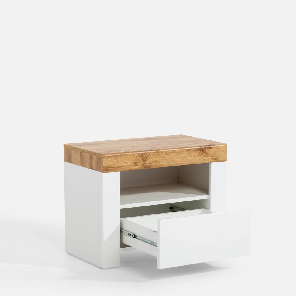 Biała szafka nocna z szufladą i otwartą półką.