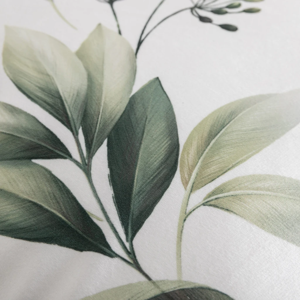 Welurowa biała poszewka w zielone liście