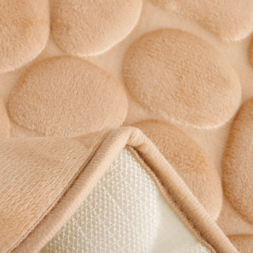 Prostokątny dywanik ze wzorem w kamienie