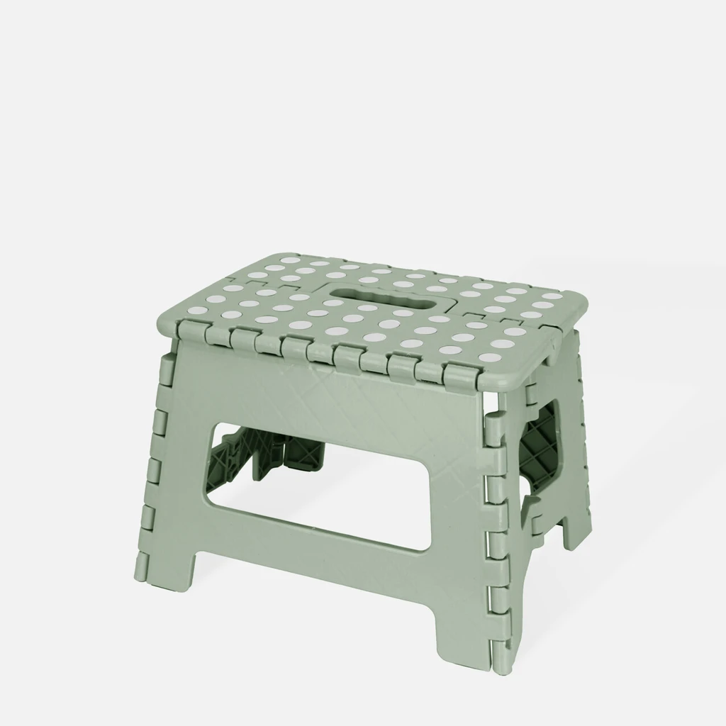 Zielony niski stołek składany