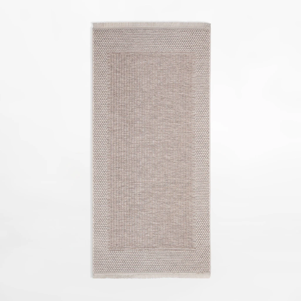 Prostokątny beżowy dywan